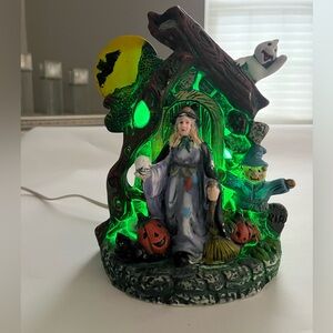 Fabulous ceramic Halloween table top decoration.  solid & blinking green light.